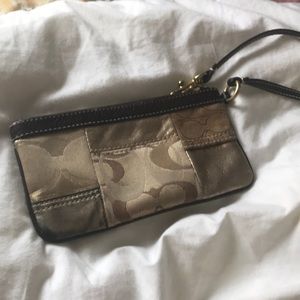 “Coach” wristlet! Gold and brown